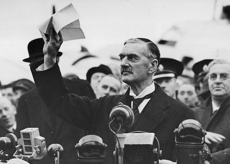 Pearl Harbor Munich_Agreement_Munchener_Abkommen_1938-09-30_Neville_Chamberlaine_showing_the_Anlo-German_declaration__Peace_for_our_time_._Heston_Aerodrome_west_of_London_England._Narodowe_Archiw-1 Significant Events that Led to World War II  